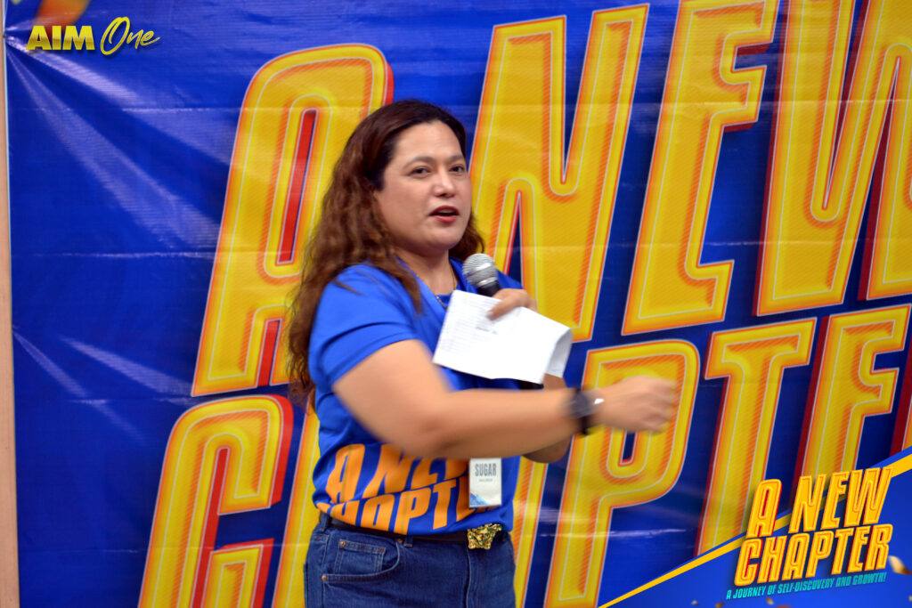 A member speaking on stage