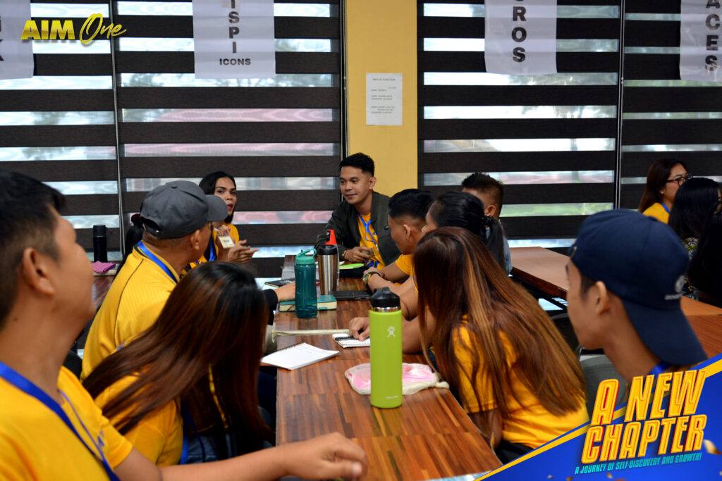 A small group working together at a table